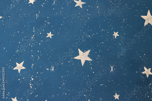 Blue painted wall with white star photo