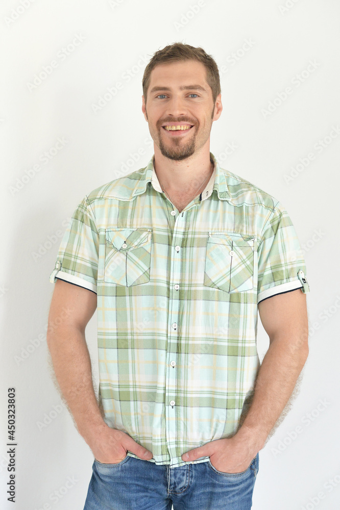 handsome young man posing in studio handsome young man posing in studio