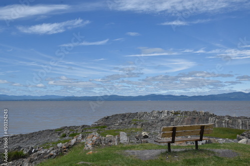A bench along the St.Lawrence River. Québec, Canada