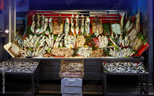 Fish shop, mixed type fish and fish stand photo