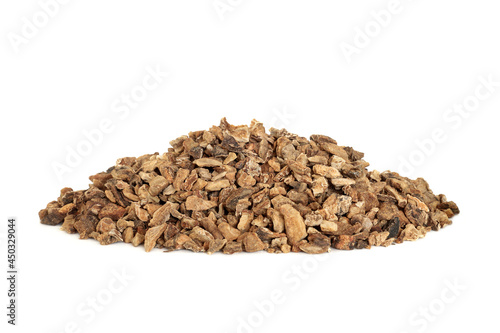 Devils claw root used in herbal medicine to treat arteriosclerosis, arthritis, gout, fibromyalgia, tendinitis, heartburn, migraine, muscle pain and fever. On white background. photo