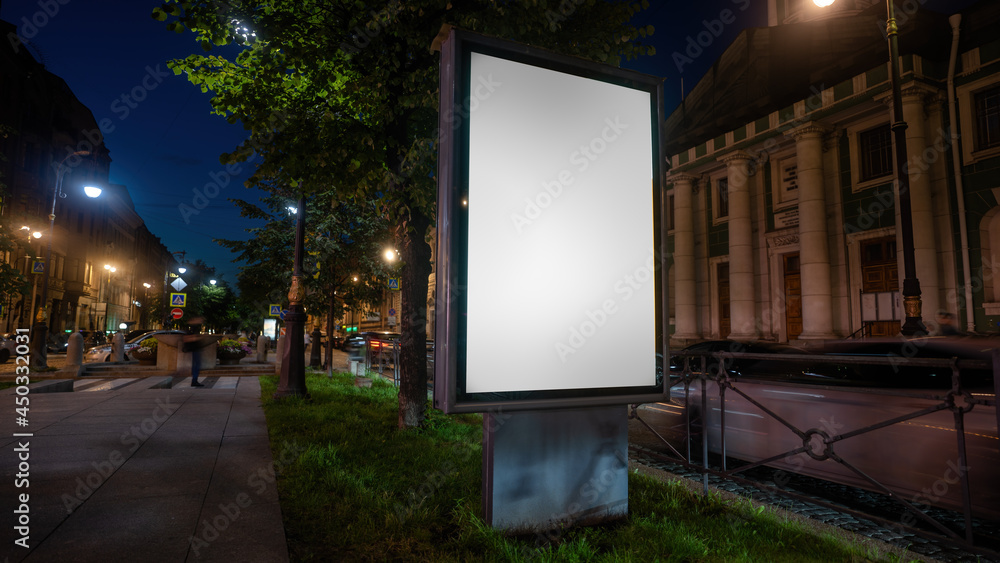 Billboard for a poster on the background of the city at night. Vertical billboard mock-up. Billboard for a poster on the background of the city at night. Vertical billboard mock-up.