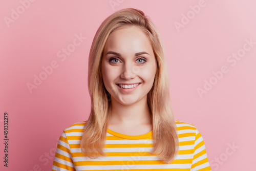 Portrait of cheerful positive girl toothy smile on pink background