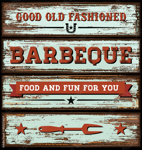 A wooden sign or invitation made from an old barn for a BBQ