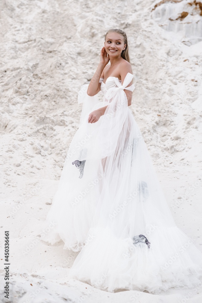 Beautiful wedding bride day outdoors at ocean beach. Happy marriage couple o