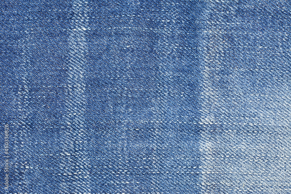 Naklejka premium Jeans torn denim texture.