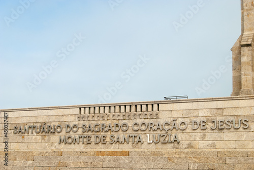 Viana do Castelo, Portugal - July 30, 2021: Sanctuary of Santa Luzia, The Temple of the Sacred Heart of Jesus Saint Lucy Mountain Text sign above the stairs at the foot of the church - Space for text