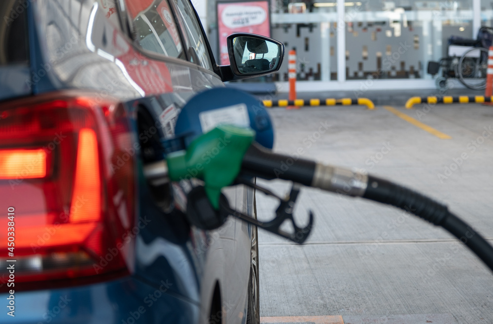 Fuel up in the gas station photo, fuel pump in the gasoline supply tank, oil