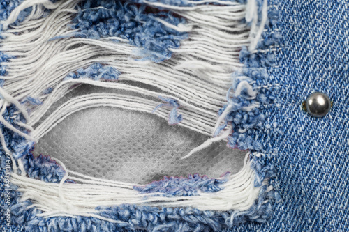 Jeans torn denim texture.