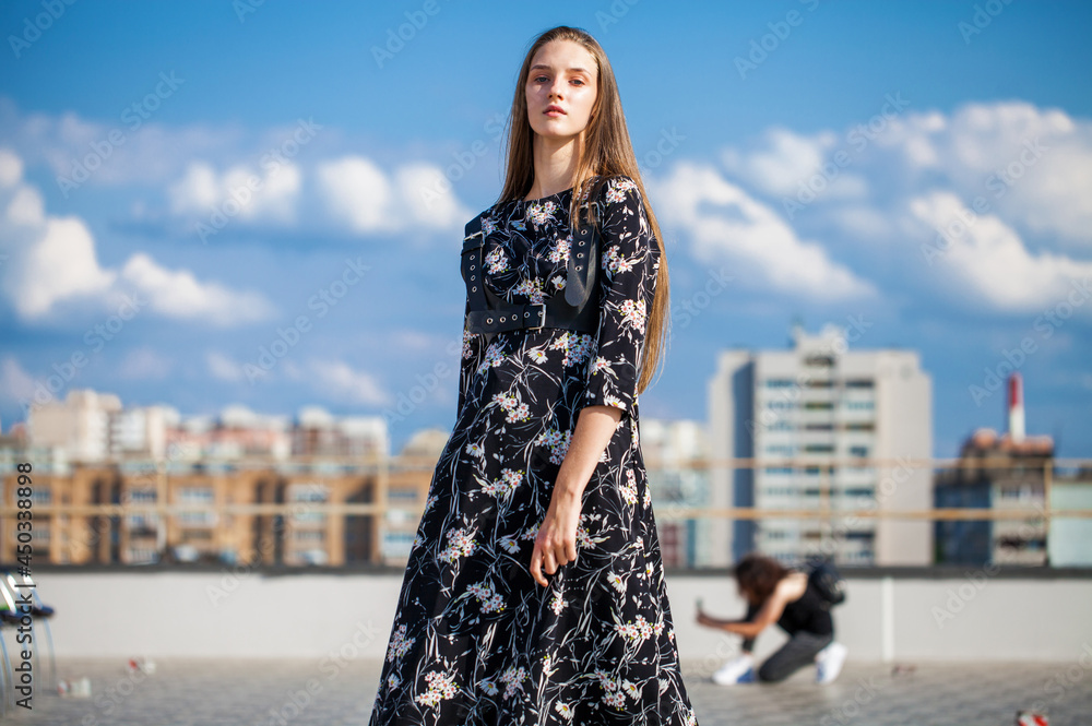 Close up portrait of a young beautiful girl in summer dress