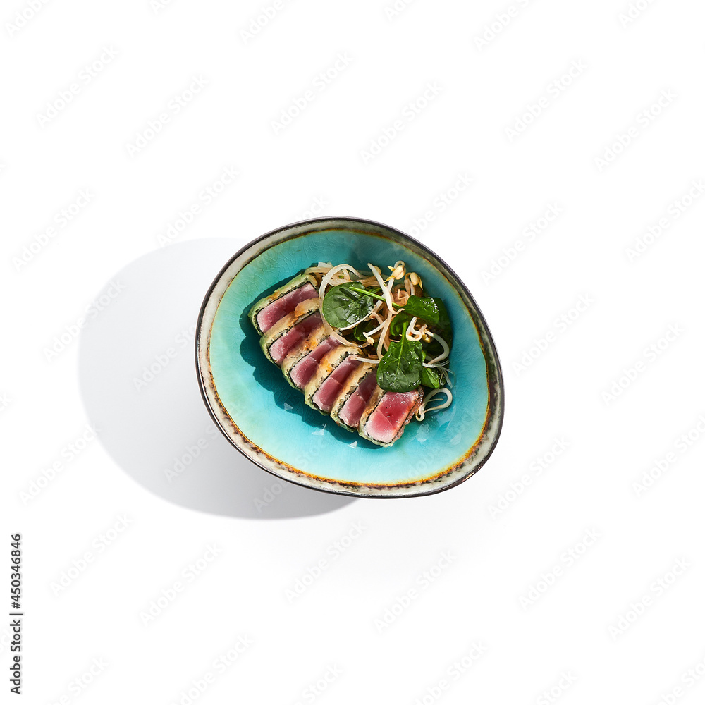 Tuna tataki seared tuna,. thinly sliced sashimi style. Tuna tataki served with delicious