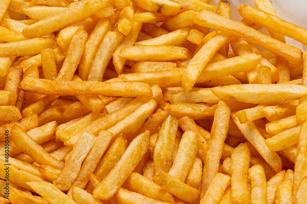 Portion of Fried Potatoes, cut into thin slices, seasoned with salt Portion of Fried Potatoes, cut into thin slices, seasoned with salt