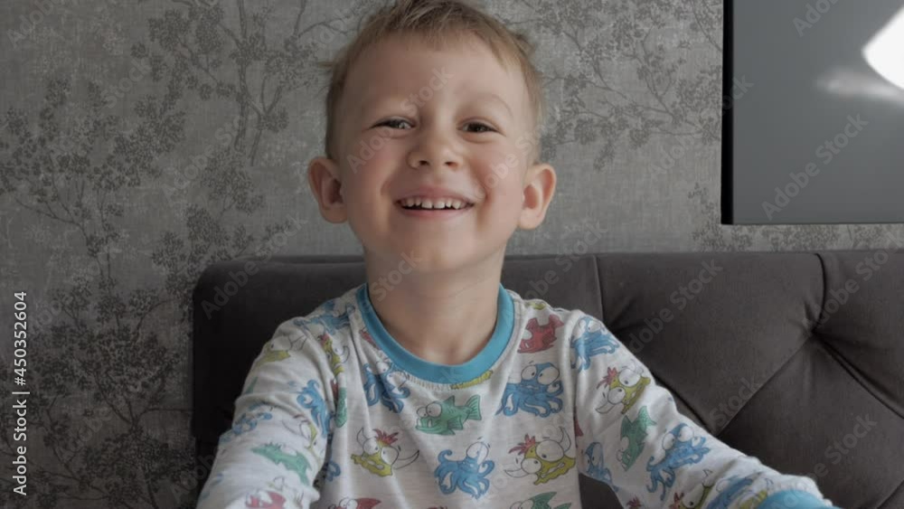 Portrait of happy laughing beautiful little boy at home Portrait of happy laughing beautiful little boy at home