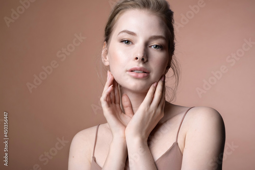 Photography Pretty young caucasian female touching perfect flawless healthy skin