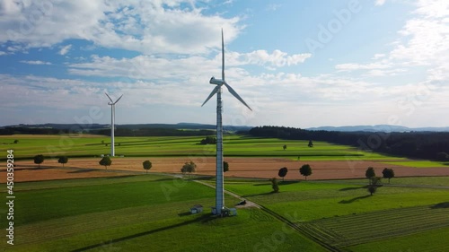 Aerial View Of Windturbine Windmill At Sunrise. Wind Energy Turbines