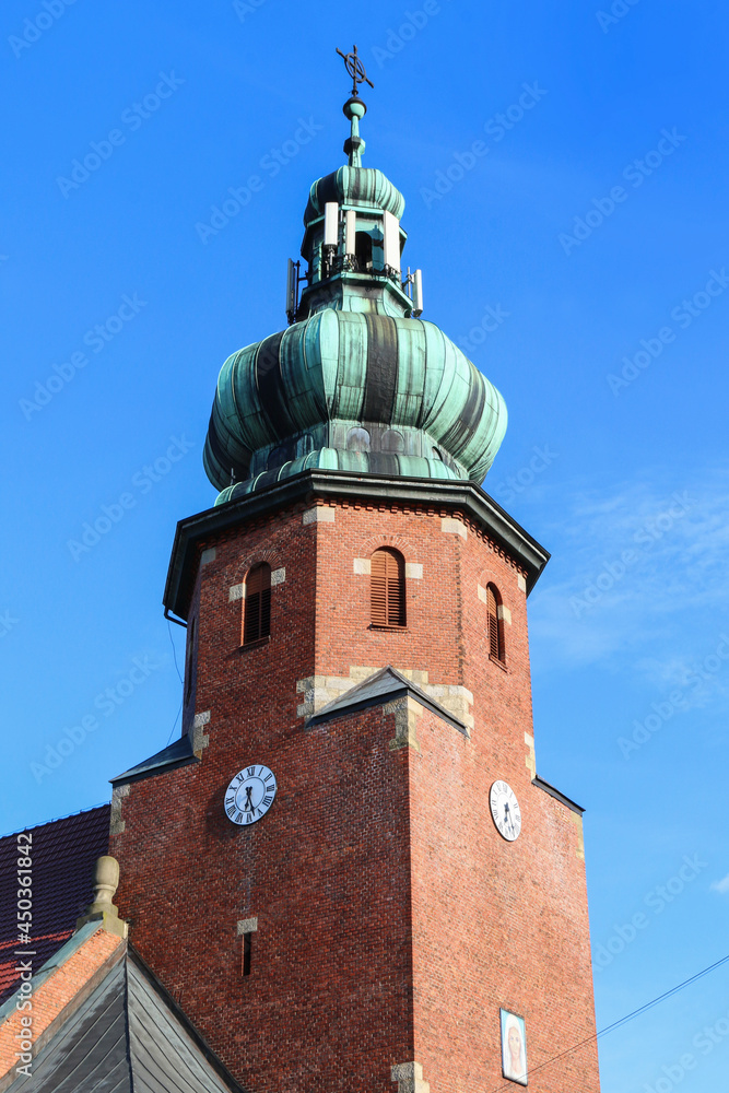 ZEMBRZYCE ,POLAND - JUNE 01, 2021: Church of St. John the Baptist in Zembrzyce, Poland. ZEMBRZYCE ,POLAND - JUNE 01, 2021: Church of St. John the Baptist in Zembrzyce, Poland.