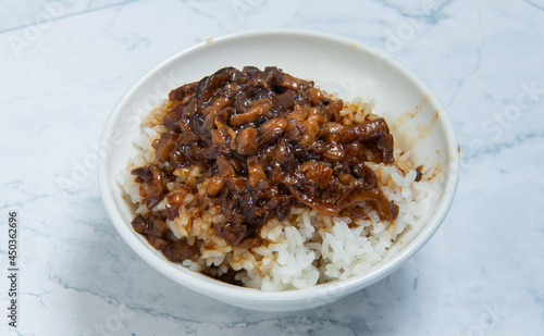 braised pork on rice is Minced pork served with pickles on top of steamed rice, taiwan food