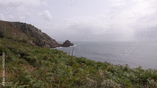 Looking across the cliffs and out to sea at Boscawen Point in West Cornwall, UK photo