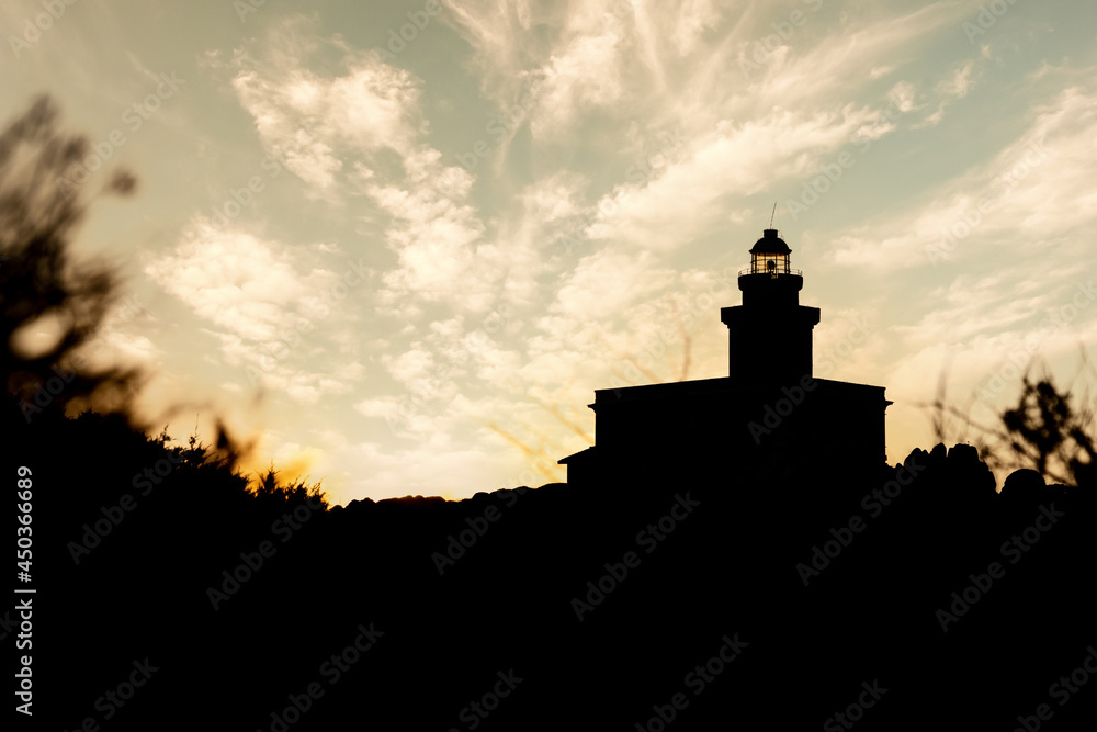 Silhouette view of lighthouse in Capo Testa at sunset - Sardinia