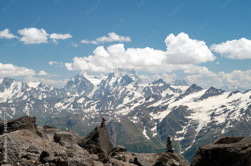 Snow-capped peaks of the Caucasus Mountains in Russia. View of Ushba Mountain