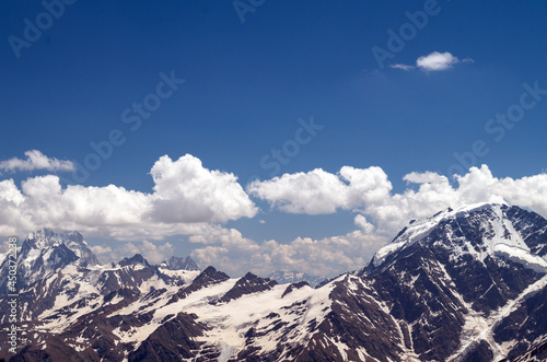 Snow-capped peaks of the Caucasus Mountains in Russia.Glacier at an altitude of 3800m.