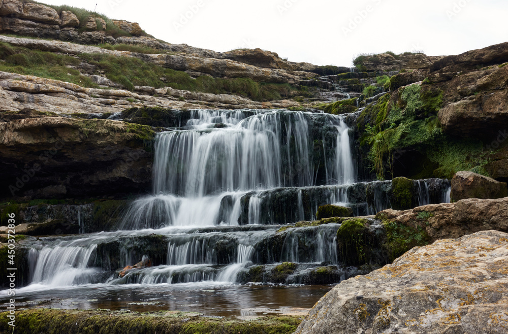Obraz premium silk effect in small river waterfall