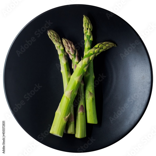 Jiant asparagus isolated on black