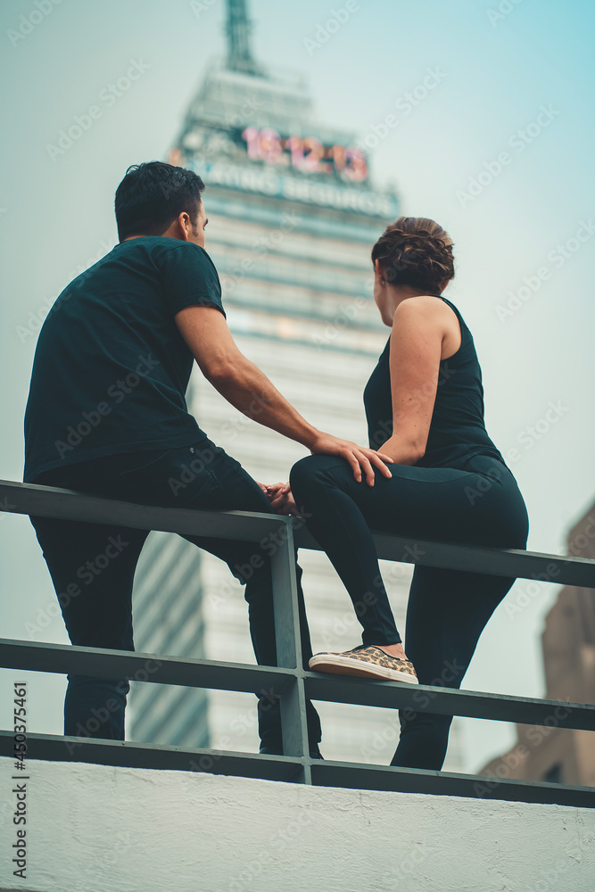portrait from behind of a beautiful couple hugging portrait from behind of a beautiful couple hugging