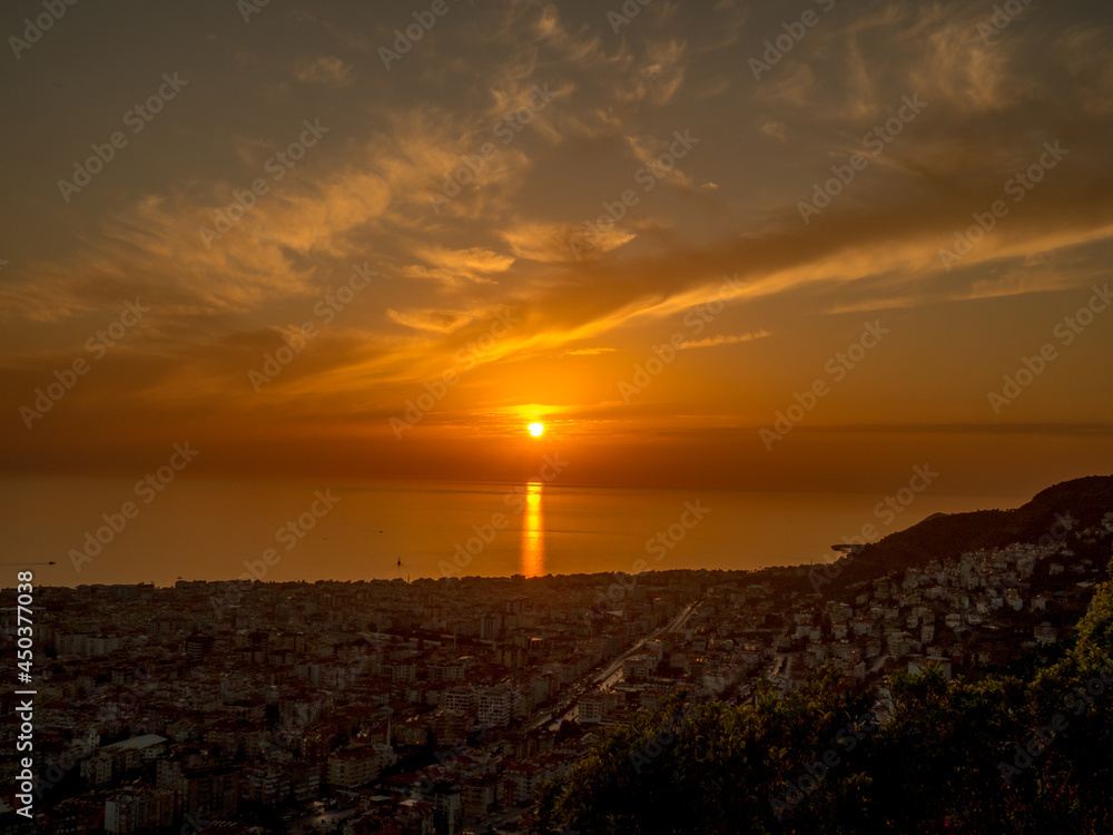 Seen from Alanya, Turkey at sunset from a mountain behind