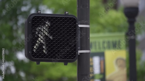 A crosswalk sign in downtown Tulsa, Oklahoma.  