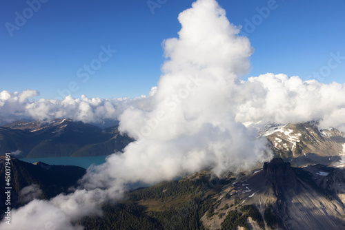 Aerial View from Airplane of Canadian Mountain Landscape. Sunny Summer Clouds. Garibaldi between Squamish and Whistler, North of Vancouver, BC, Canada. © edb3_16