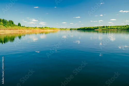 Summer Landscape With Narew River And Clouds On The Blue Sky