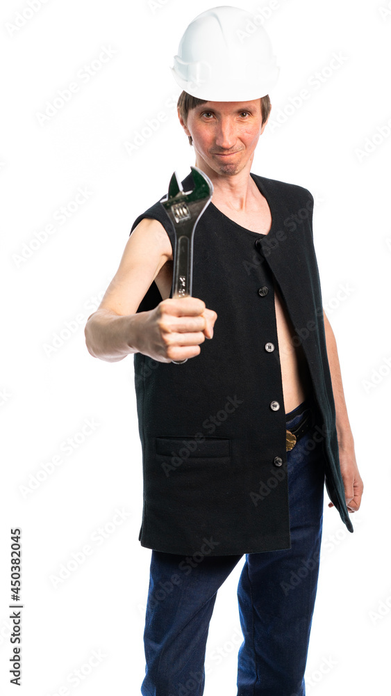 a man in a chenrom vest on a naked body, in a white helmet, holds an adjustable wrench with one hand