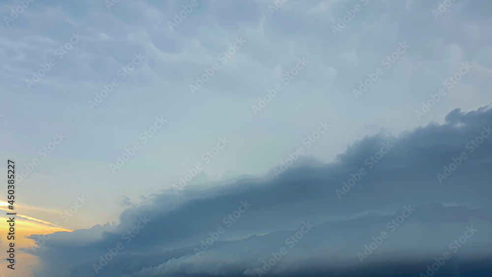 Blue sky with clouds, flying birds and green branches. Summer nature. Road. Blue sky with clouds, flying birds and green branches. Summer nature. Road.