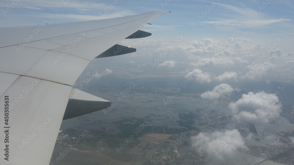Obraz premium Airplane over East Asia