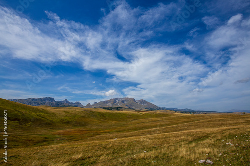 Beautiful mountain valley and blue sky in the north of Montenegro