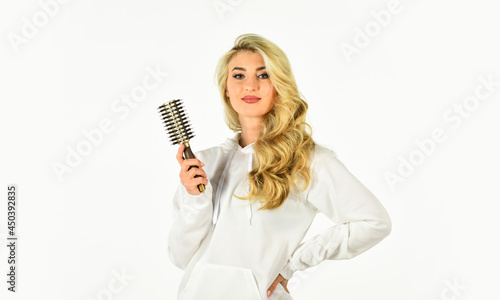 Pretty woman brushing hair isolated on white. Long hair. Hair care. Hairdresser salon. Professional equipment. Easy hairdo. Beauty supplies. Avoid over drying and overheating. Hot curling brush