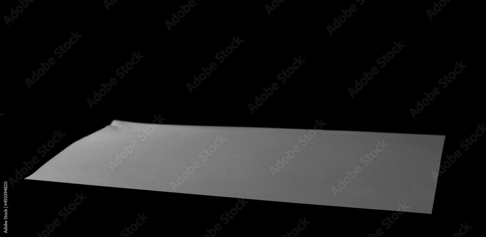 White paper for writing and printing isolated on black background White paper for writing and printing isolated on black background