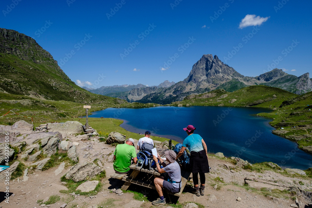people on Ayous hut, Gentau lake, Ayous lakes tour, Pyrenees National Park, Pyrenees Atlantiques, France