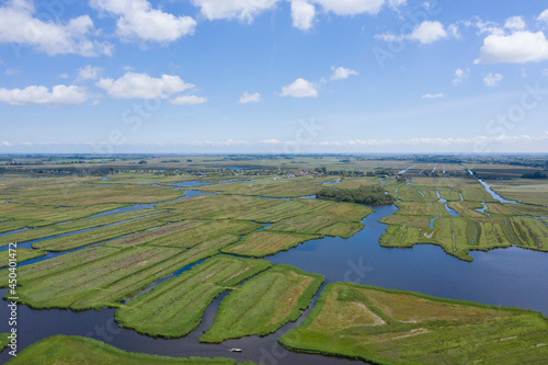 Aerial view of  over Historic dutch Waterland landscape in may, the ilperveld near Den Ilp and Landsmeer the  Netherlands