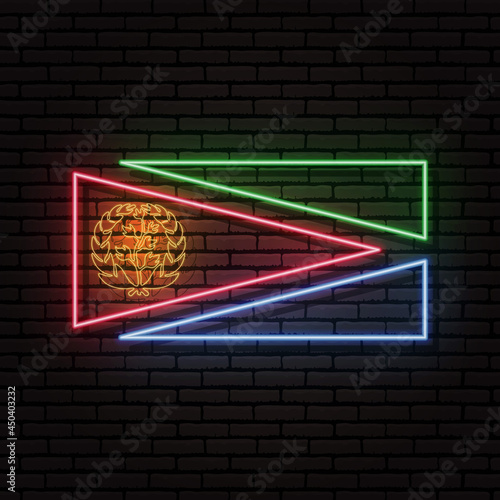 Neon sign in the form of the flag of Eritrea. Against the background of a brick wall with a shadow. For the design of tourist or patriotic themes. The African continent photo