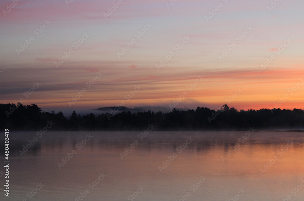 Bluish-Orange Mist on Lake