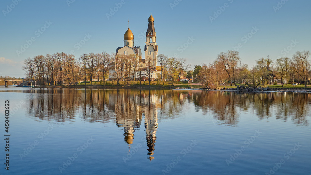 Panorama of Petrovskaya Embankment and the Orthodox Cathedral in Sestroretsk near the lake.