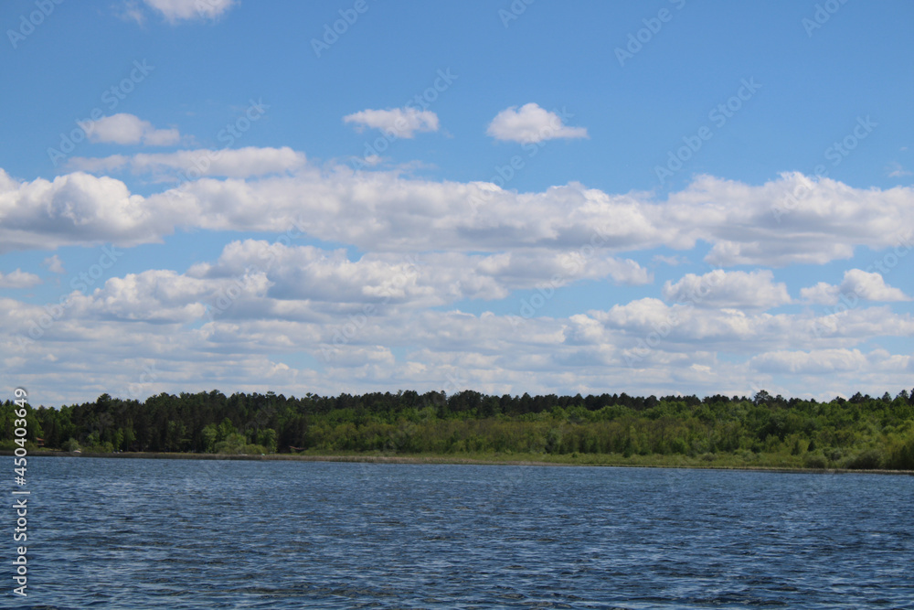 Calm Blue Minnesota Lake with Clouds