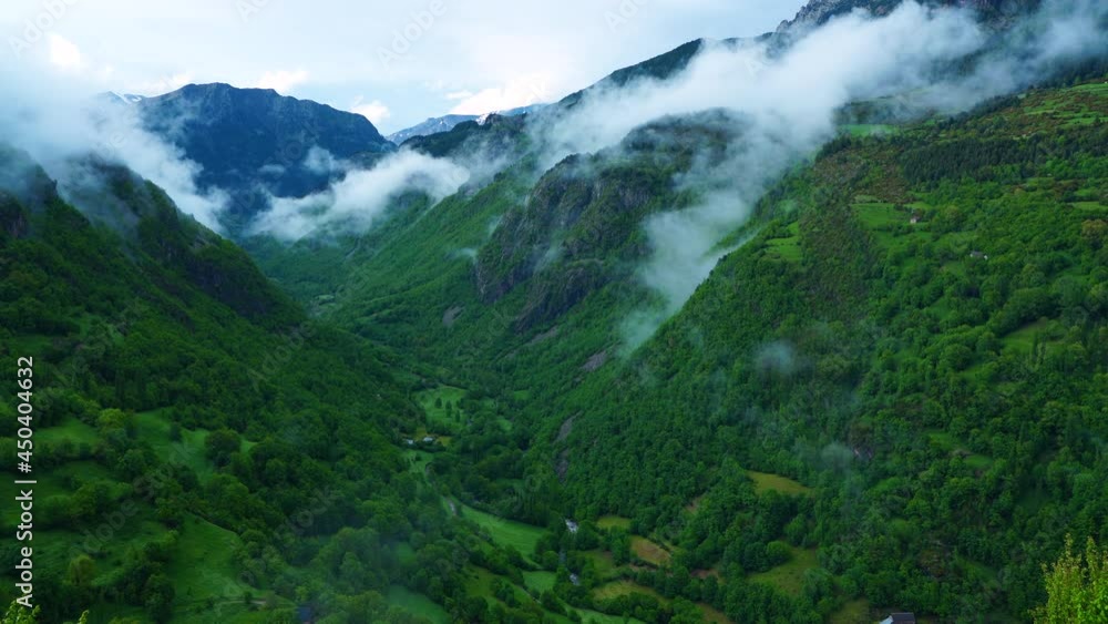 Aerial view of the Cinqueta river valley in spring from La Cruz de Puyadase. Gistain or Chistau Valley. Sobrarbe region, Huesca, Aragon, Spain, Europe. Aerial view of the Cinqueta river valley in spring from La Cruz de Puyadase. Gistain or Chistau Valley. Sobrarbe region, Huesca, Aragon, Spain, Europe.