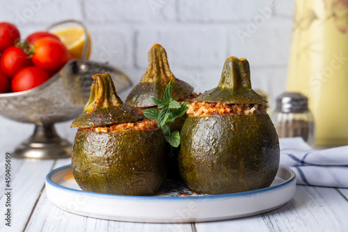 Zucchini stuffed with meat, rice and vegetables. Traditional delicious Turkish food, mini ball stuffed zucchini (Turkish name; top kabak dolmasi) photo