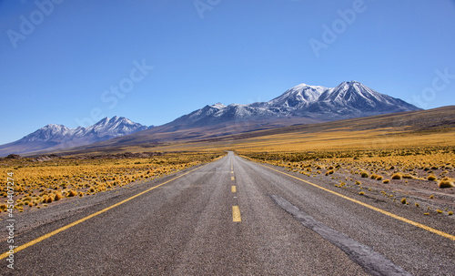 Driving through the amazing landscape of the Salar Aguas Calientes, Atacama Desert, Chil