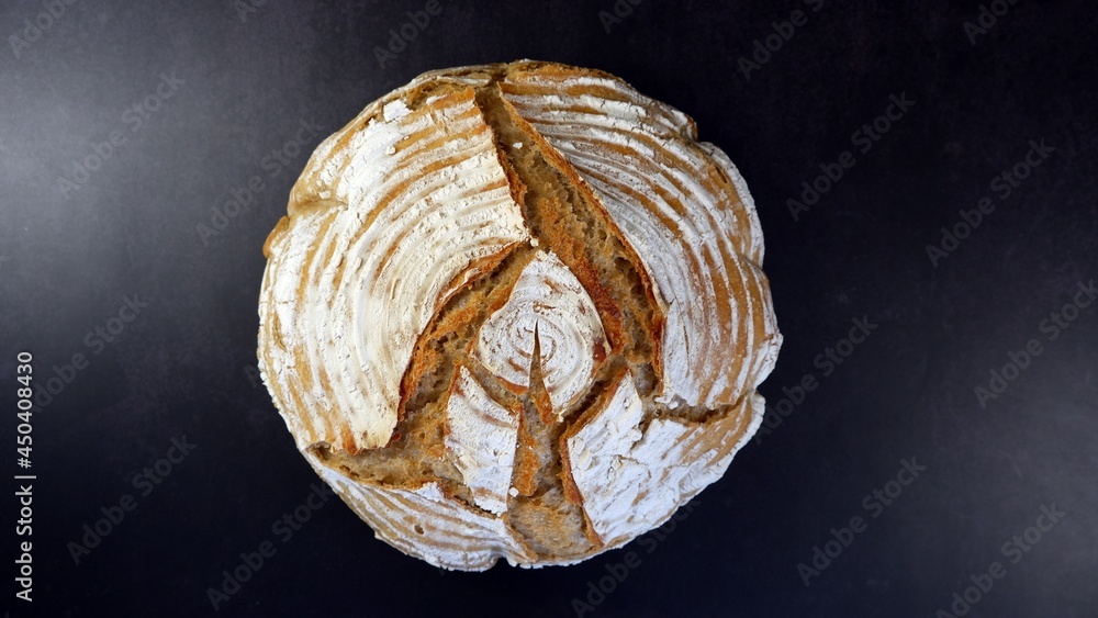 Freshly baked loaf of bread photographed from above Freshly baked loaf of bread photographed from above
