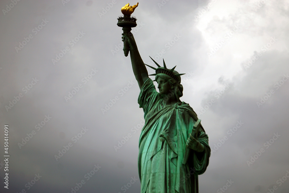 Fototapeta premium Statue of Liberty, Cloudy Backdrop