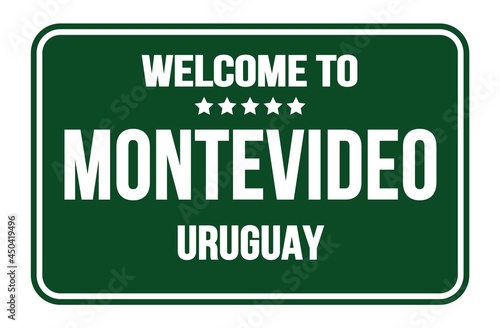 WELCOME TO MONTEVIDEO - URUGUAY, words written on green street sign stamp © outchill